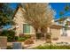 Two story home with tan exterior and two car garage at 2440 E Saint Catherine Ave, Phoenix, AZ 85042