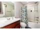Clean bathroom with tub, shower, and updated vanity at 2440 E Saint Catherine Ave, Phoenix, AZ 85042