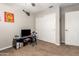 Bright bedroom with double doors and ample closet space at 2440 E Saint Catherine Ave, Phoenix, AZ 85042