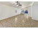 Spacious living room featuring tile floors and sliding glass doors at 11527 E Contessa St, Mesa, AZ 85207