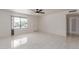 Bright living room with tile floors and ceiling fan at 8508 W Clarendon W Ave, Phoenix, AZ 85037