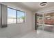 Bright dining area with tile floors and sliding glass doors to patio at 8508 W Clarendon W Ave, Phoenix, AZ 85037