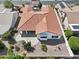 Aerial view of single-story home with tile roof and desert landscaping at 15016 W Monterey Way, Goodyear, AZ 85395