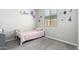 Cozy bedroom with twin bed and Frozen wall decals at 17657 W Buckhorn Trl, Surprise, AZ 85387