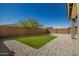 Artificial turf and gravel backyard at 17657 W Buckhorn Trl, Surprise, AZ 85387