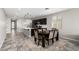 Kitchen and dining area with modern appliances and an open floor plan at 17657 W Buckhorn Trl, Surprise, AZ 85387