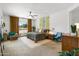 Spacious main bedroom with ample natural light and a ceiling fan at 21487 E Arroyo Verde Dr, Queen Creek, AZ 85142