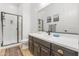 Modern bathroom with a double vanity and walk-in shower at 21487 E Arroyo Verde Dr, Queen Creek, AZ 85142