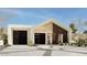 Modern home with a two-car garage and landscaped yard at 2136 E Paradise Ln, Phoenix, AZ 85022