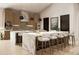 Modern kitchen with large island and marble countertops at 2136 E Paradise Ln, Phoenix, AZ 85022
