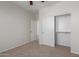 Bedroom with ceiling fan, closet, and neutral walls at 40752 W Robbins Dr, Maricopa, AZ 85138