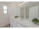 Bathroom with a vanity, mirror, and shower at 40752 W Robbins Dr, Maricopa, AZ 85138