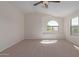 Spacious bedroom with vaulted ceiling, window seat, and carpet at 40752 W Robbins Dr, Maricopa, AZ 85138