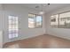 Breakfast nook with tile flooring, backyard access, and windows at 40752 W Robbins Dr, Maricopa, AZ 85138