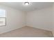 Bright bedroom with neutral walls and carpet flooring at 40752 W Robbins Dr, Maricopa, AZ 85138