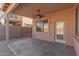 Covered patio with ceiling fan, perfect for outdoor relaxation at 40752 W Robbins Dr, Maricopa, AZ 85138