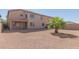 Spacious backyard with gravel and a view of the house at 40752 W Robbins Dr, Maricopa, AZ 85138