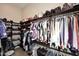 Large walk-in closet with ample shelving and hanging space at 4455 E Quail Brush Rd, Cave Creek, AZ 85331