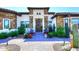 Inviting front entry with stone accents and landscaping at 4455 E Quail Brush Rd, Cave Creek, AZ 85331