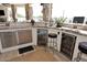 Outdoor bar with granite countertop and beverage coolers at 4455 E Quail Brush Rd, Cave Creek, AZ 85331