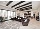 Spacious living room with high ceilings, exposed beams, and access to backyard at 4455 E Quail Brush Rd, Cave Creek, AZ 85331