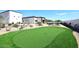 Landscaped backyard with artificial putting green at 4455 E Quail Brush Rd, Cave Creek, AZ 85331