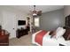 Spacious bedroom with ensuite bathroom and ceiling fan at 4455 E Quail Brush Rd, Cave Creek, AZ 85331