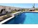 Relaxing pool with waterfall feature and landscaping at 4455 E Quail Brush Rd, Cave Creek, AZ 85331