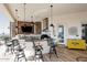 Rustic outdoor kitchen with granite countertops and bar seating at 4455 E Quail Brush Rd, Cave Creek, AZ 85331