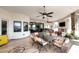 Spacious outdoor patio with seating area and ceiling fans at 4455 E Quail Brush Rd, Cave Creek, AZ 85331