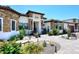Stunning home exterior with stone accents and landscaped yard at 4455 E Quail Brush Rd, Cave Creek, AZ 85331