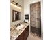 Updated bathroom with granite vanity and walk-in shower at 4455 E Quail Brush Rd, Cave Creek, AZ 85331