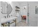 Modern bathroom with marble vanity and walk-in shower at 3615 N 40Th St, Phoenix, AZ 85018