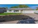 Updated single-story home with landscaped yard and attached garage at 6646 S La Rosa Dr, Tempe, AZ 85283