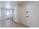 Laundry room with built-in shelving and exterior access at 6646 S La Rosa Dr, Tempe, AZ 85283