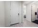 Bright entryway with view to bedroom and bathroom at 12075 N San Clemente St, Surprise, AZ 85388