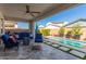 Relaxing backyard oasis with a sparkling pool and patio furniture at 12075 N San Clemente St, Surprise, AZ 85388