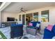 Outdoor patio with seating area and fire pit at 12075 N San Clemente St, Surprise, AZ 85388