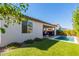 Landscaped backyard with a sparkling pool and patio at 12075 N San Clemente St, Surprise, AZ 85388