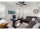 Home office with large desk, comfortable seating, and plenty of storage at 12075 N San Clemente St, Surprise, AZ 85388