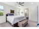 Bright bedroom with a comfortable bed and en-suite bathroom access at 12075 N San Clemente St, Surprise, AZ 85388