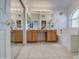 Bathroom with double vanity, large mirror, and a soaking tub at 10300 E Trailhead Ct, Gold Canyon, AZ 85118