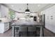 Modern kitchen with large island, stainless steel appliances, and white cabinetry at 13110 W Denton St, Litchfield Park, AZ 85340