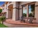 Inviting front porch with two chairs and a view at 13110 W Denton St, Litchfield Park, AZ 85340