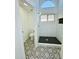 Updated bathroom features a walk-in shower, patterned tile floor, and modern vanity at 5984 W Geronimo Ct, Chandler, AZ 85226