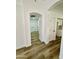 Bright hallway with vinyl wood flooring and archways at 5984 W Geronimo Ct, Chandler, AZ 85226