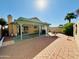 Charming backyard featuring a covered patio and brick paver patio at 5984 W Geronimo Ct, Chandler, AZ 85226