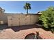 Landscaped backyard with storage shed and brick paver patio at 5984 W Geronimo Ct, Chandler, AZ 85226