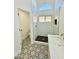 Renovated bathroom includes a walk-in shower, stylish tile, and a modern vanity at 5984 W Geronimo Ct, Chandler, AZ 85226
