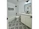 Stylish bathroom featuring a white vanity, subway tile, and a large mirror at 5984 W Geronimo Ct, Chandler, AZ 85226